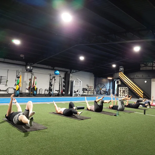Mobility class on the turf at ATHLETIX Brisbane
